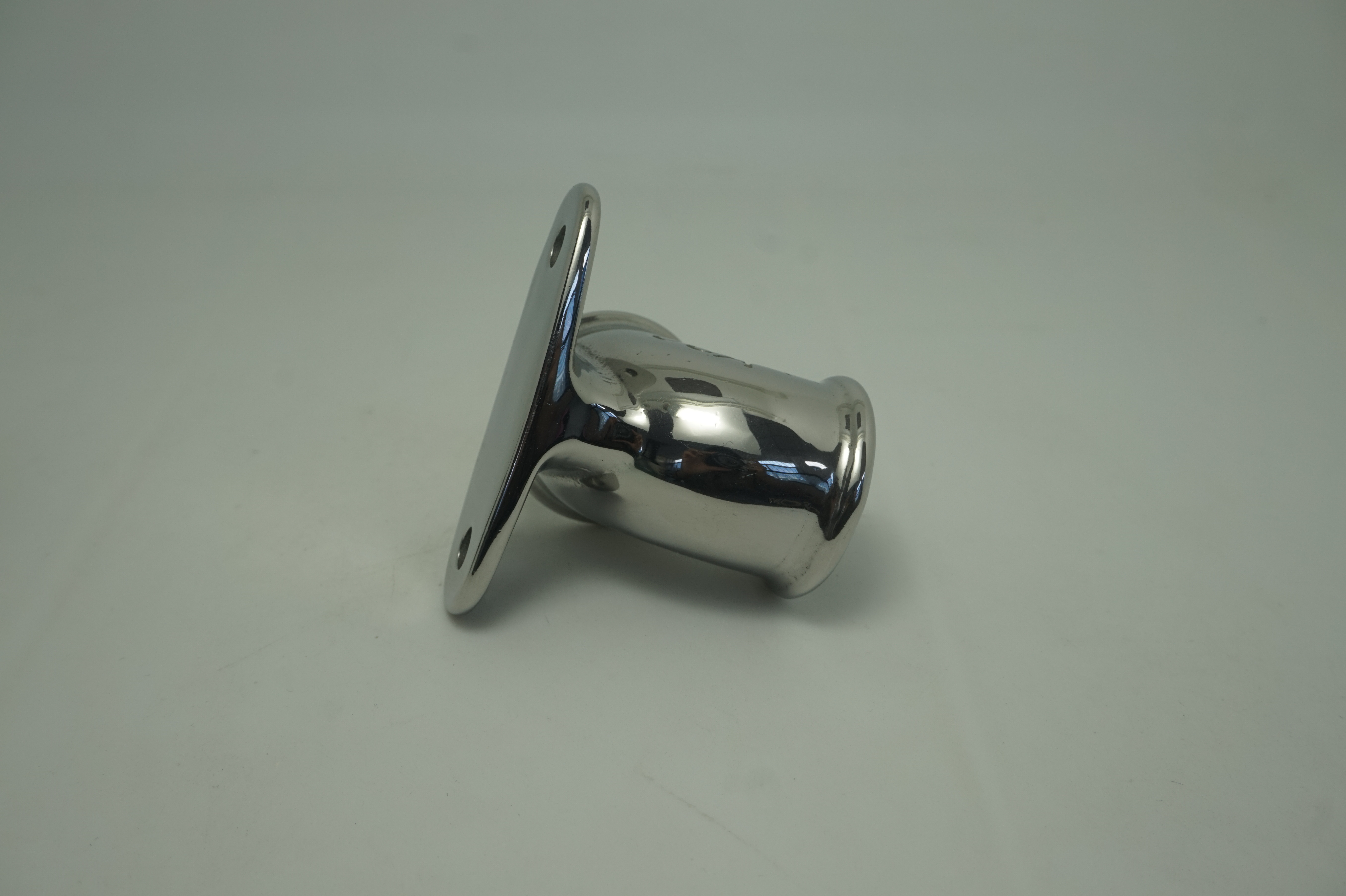 Stainless steel tube fitting photographed after polishing.