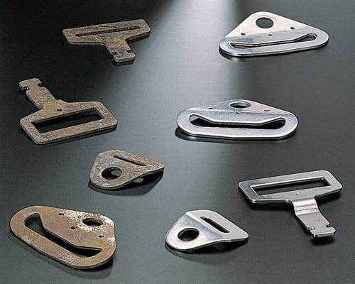 How to Deburr Stamped Metal Parts Without Tangling, Distortion, or Part-on-Part Damage