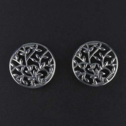 Beautiful floral-inspired disc earrings with intricate cut-out details.