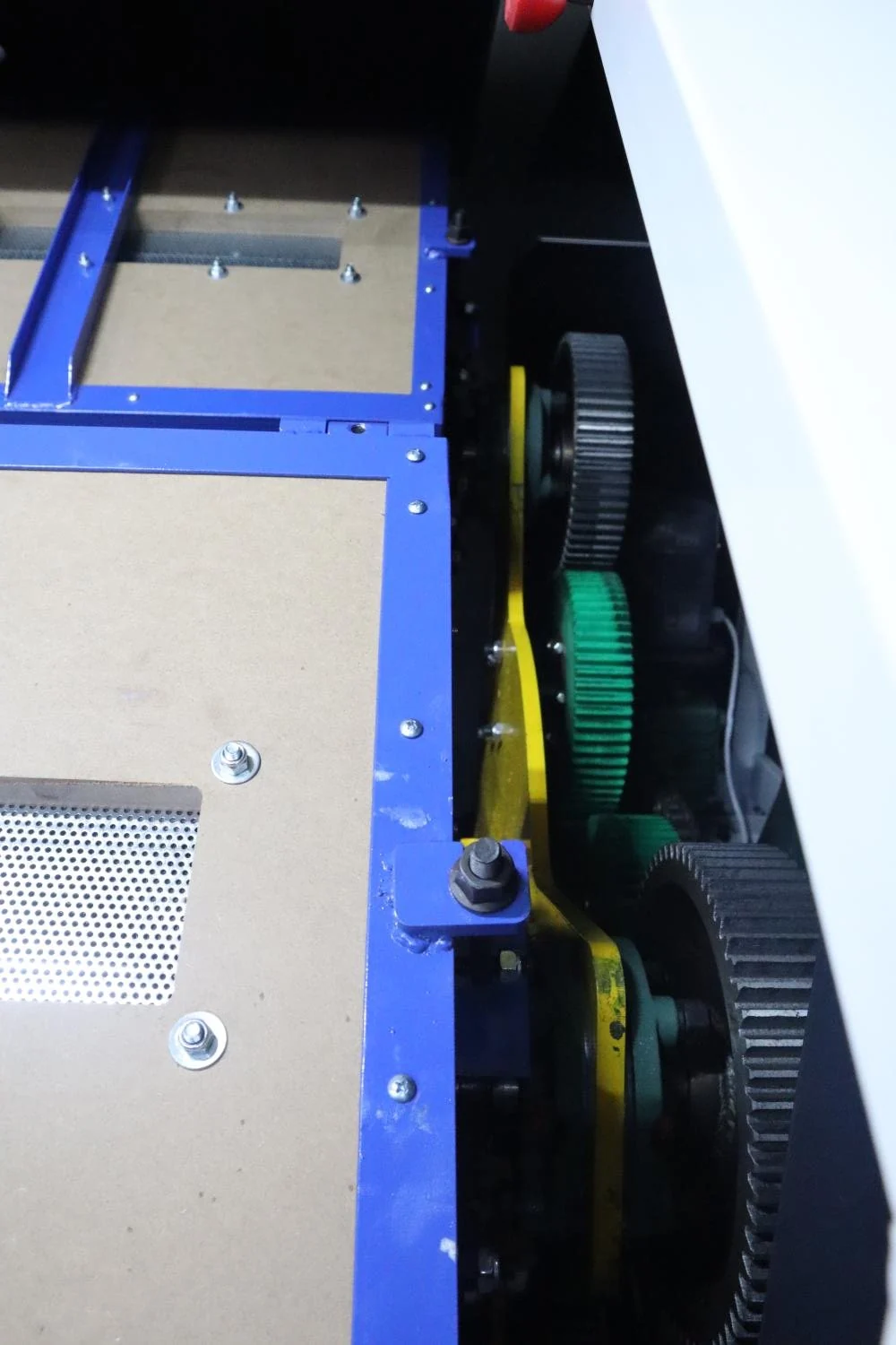 Drive gears inside industrial polishing equipment for maintenance inspection