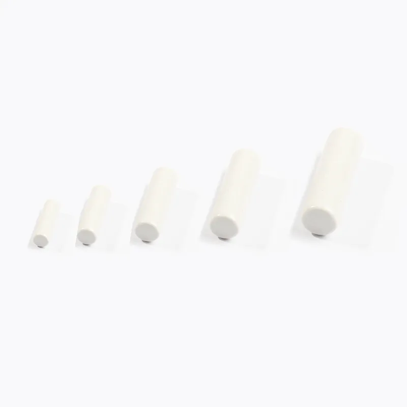 Ceramic components showing different surface finishes under magnification