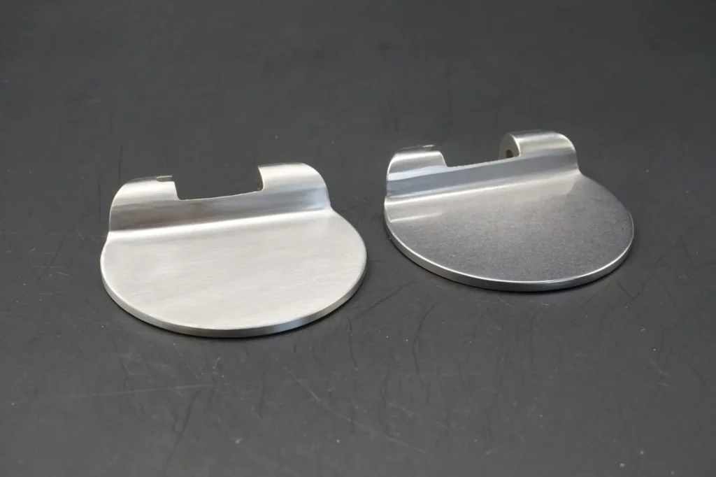 Real medical instrument metal parts showing surface finishing and edge quality comparison
