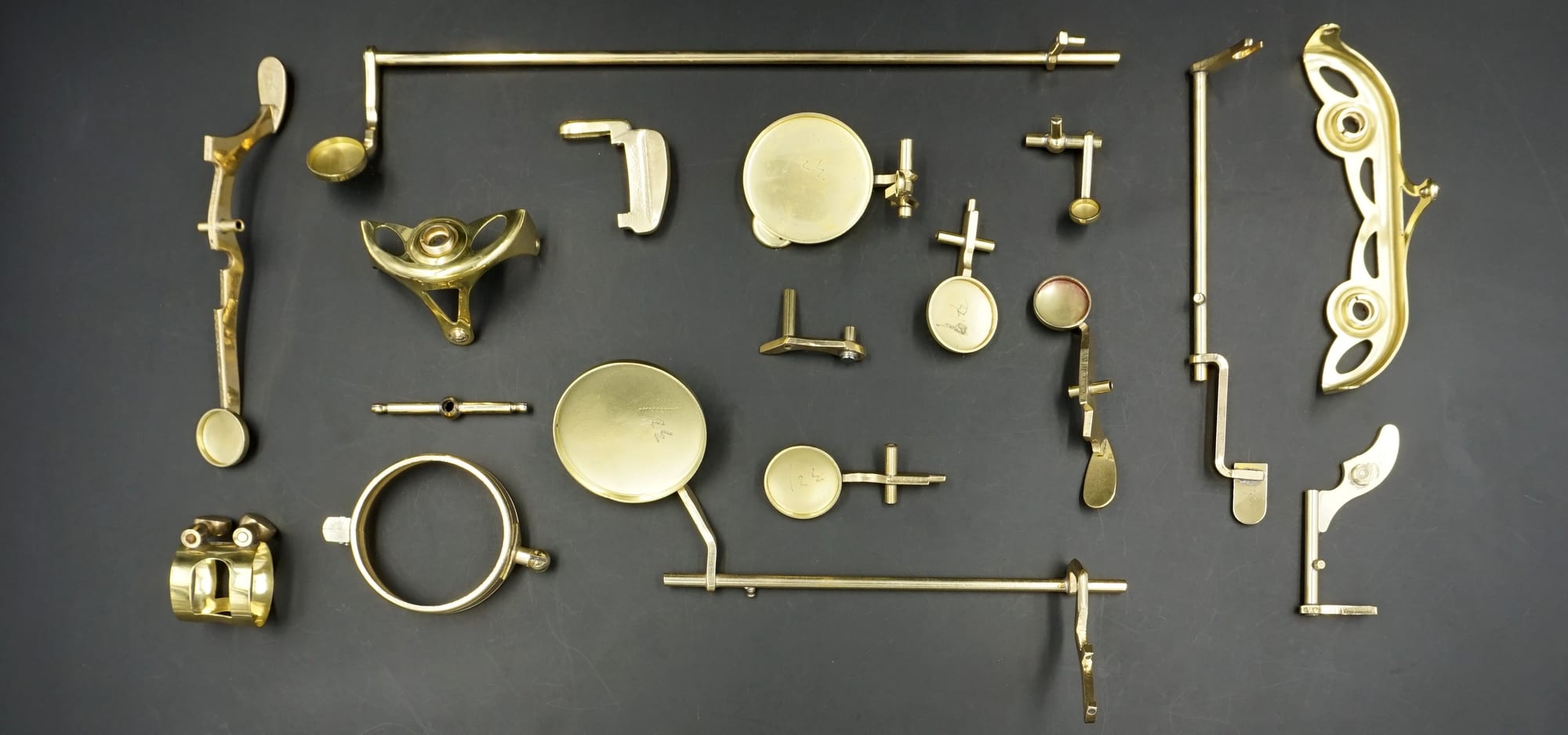 Brass saxophone fittings, a typical brass part where colour and contamination both matter