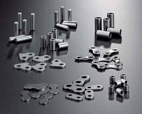 Small chain pins, rollers and link plates in volume: the load that justifies automating the handling