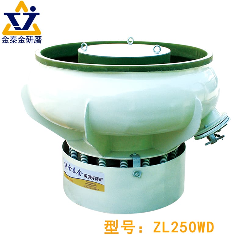 The bowl sits on a bank of coil springs: the isolation that sets the working amplitude, and the part that has to be re-tuned when the charge weight changes